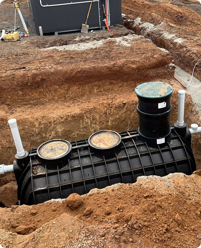 Newly installed Dylsal Plumbing septic tank with inspection lids