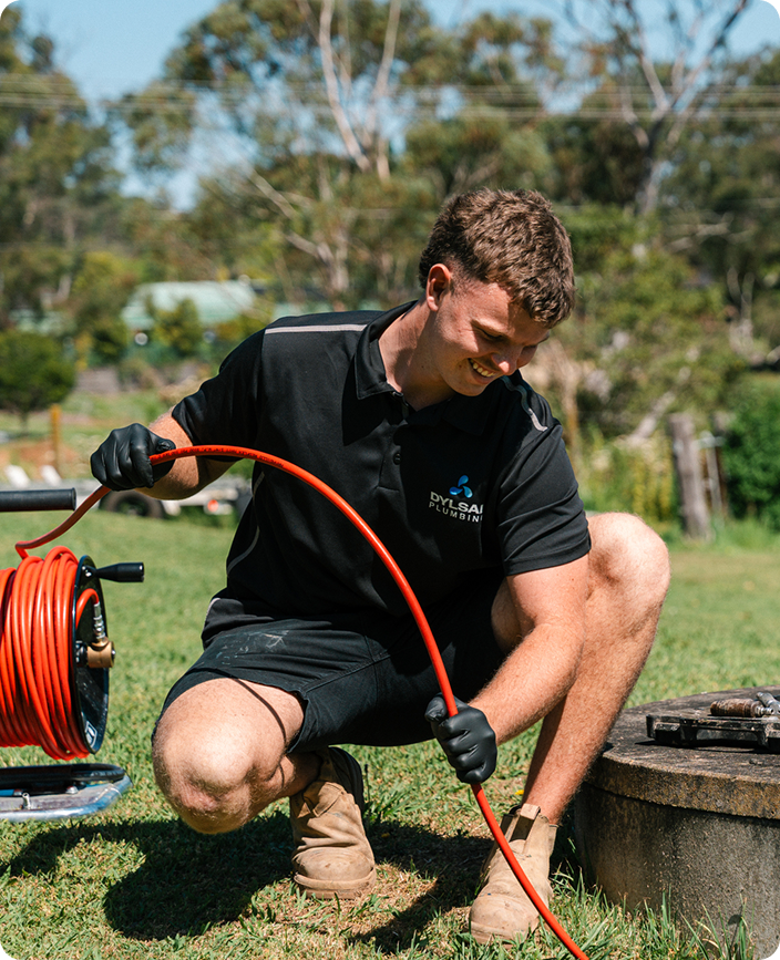 Dylsal Plumbing repairing a grease trap