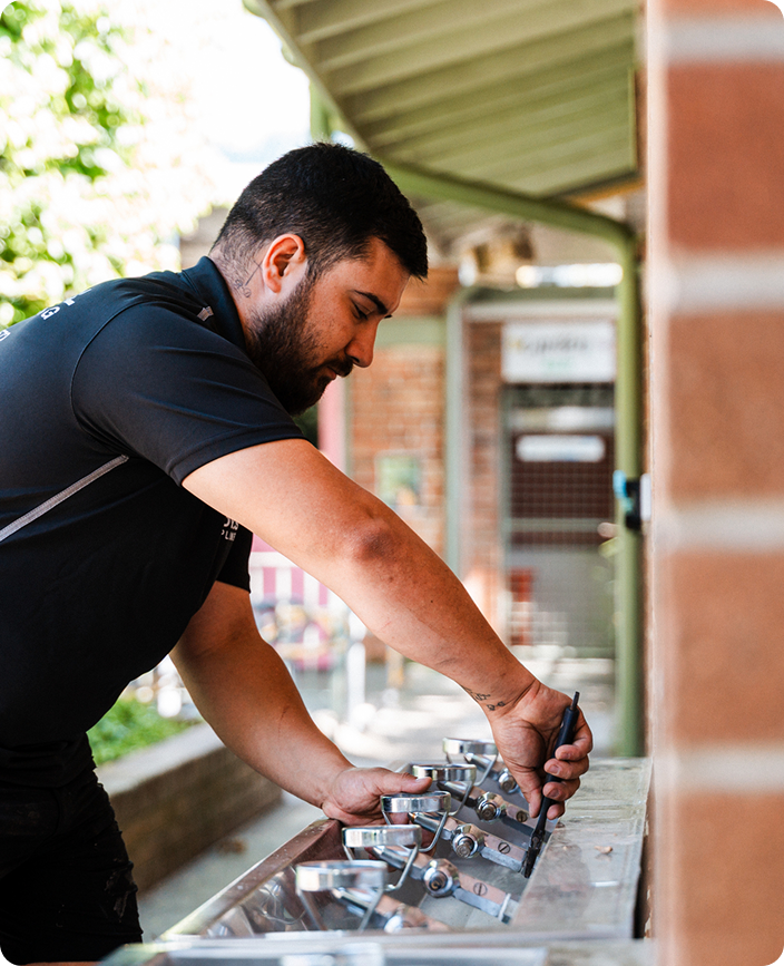 Dylsal Plumbing technician using leak detection equipment