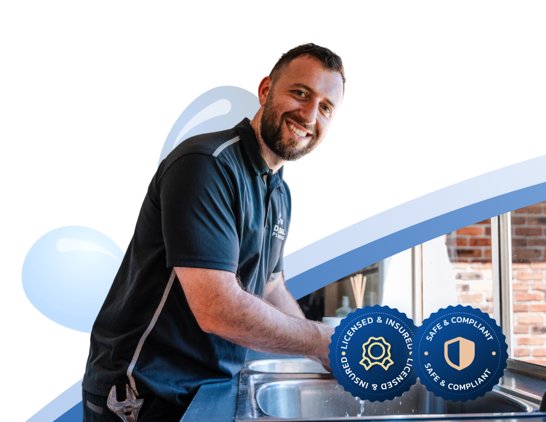 Dylsal Plumbing technician installing a sink water filter, licensed and insured